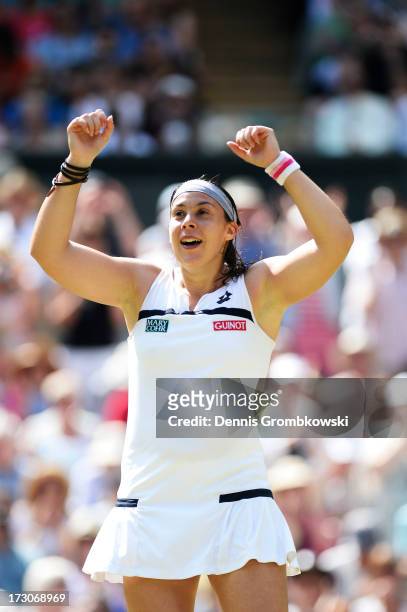 Marion Bartoli of France celebrates victory during the Ladies' Singles final match against Sabine Lisicki of Germany on day twelve of the Wimbledon...