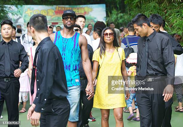 Dwyane Wade and Gabrielle Union visit Chimelong Safari Park on July 6, 2013 in Guangzhou, China.