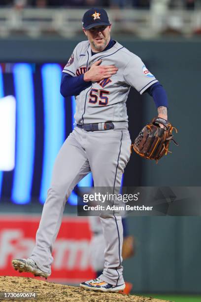 Ryan Pressly of the Houston Astros celebrates after striking out Max Kepler of the Minnesota Twins to end Game Four of the Division Series at Target...
