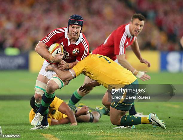 Sean O'Brien of the Lions is tackled by George Smith during the International Test match between the Australian Wallabies and British & Irish Lions...