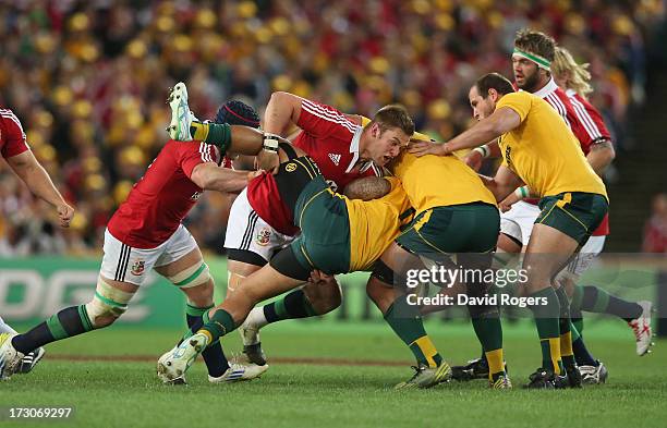 Dan Lydiate of the Lions tackles Joe Tomane during the International Test match between the Australian Wallabies and British & Irish Lions at ANZ...