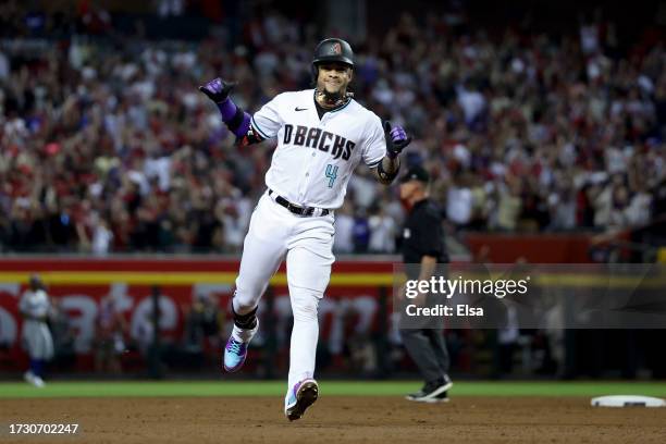 Ketel Marte of the Arizona Diamondbacks rounds the bases after hitting a home run in the third inning against the Los Angeles Dodgers during Game...