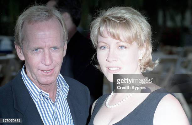Actor Paul Hogan with his wife, actress Linda Kozlowski, circa 1990.