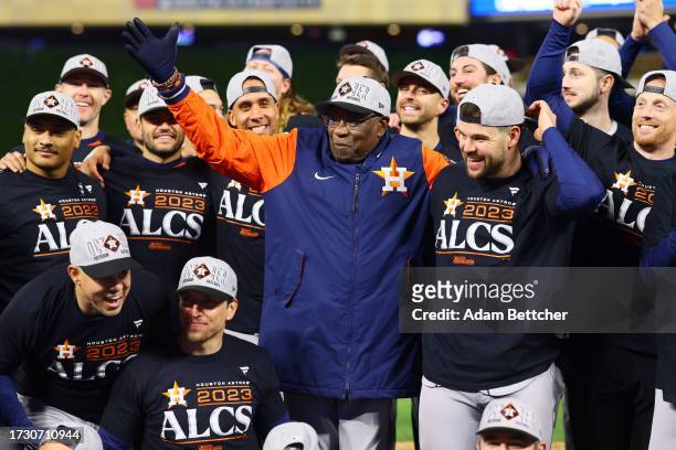 Manager Dusty Baker Jr. #12 of the Houston Astros celebrates with his team after the victory against the Minnesota Twins in Game Four of the Division...