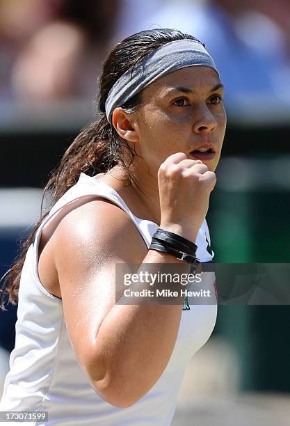 Marion Bartoli of France celebrates a point during the Ladies' Singles final match against Sabine Lisicki of Germany on day twelve of the Wimbledon...