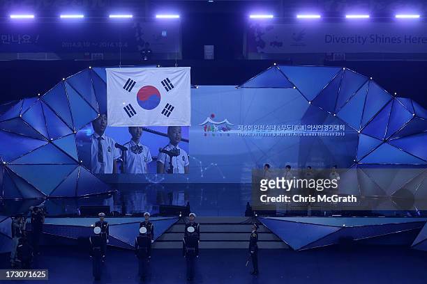 The Korean flag is raised to the roof during the closing ceremony of the 4th Asian Indoor & Martial Arts Games at Incheon Samsan World Gymansium on...
