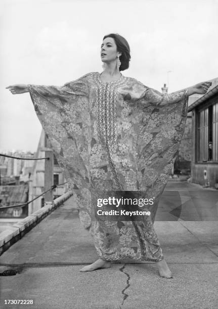 Model wears an Arabian inspired kaftan designed by 'Basta' for the autumn/winter collection, 27th October 1966.