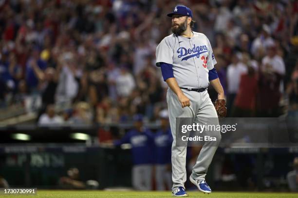 Lance Lynn of the Los Angeles Dodgers reacts after giving up a home run to Gabriel Moreno of the Arizona Diamondbacks in the third inning during Game...