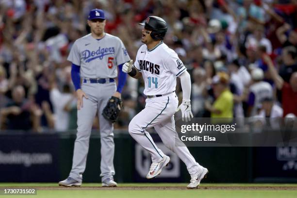 Gabriel Moreno of the Arizona Diamondbacks rounds the bases after hitting a home run in the third inning against the Los Angeles Dodgers during Game...