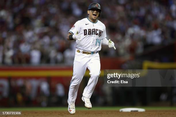 Gabriel Moreno of the Arizona Diamondbacks rounds the bases after hitting a home run in the third inning against the Los Angeles Dodgers during Game...