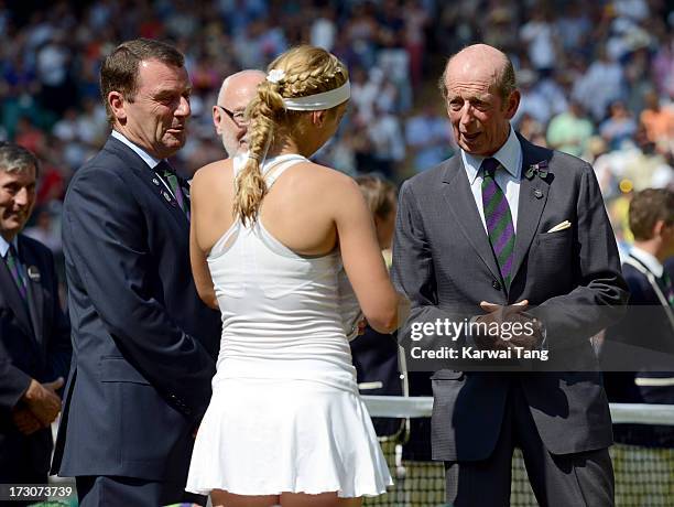 Philip Brook and Prince Edward, Duke of Kent chat with Sabine Lisicki after the Ladies Singles Final on Day 12 of the Wimbledon Lawn Tennis...