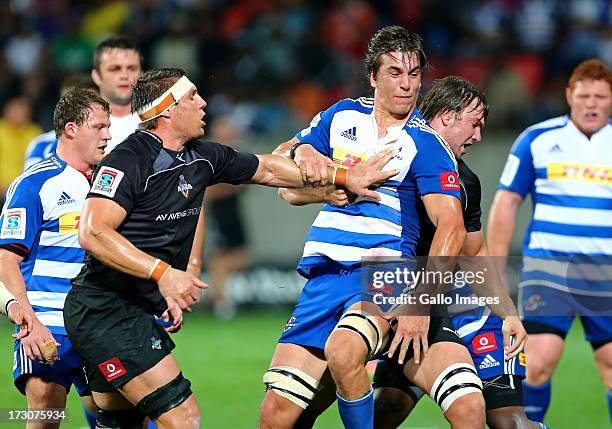 Darron Nell of the Southern Kings and Eben Etzebeth of the DHL Stormers clash during the Super Rugby match between Southern Kings and DHL Stormers at...