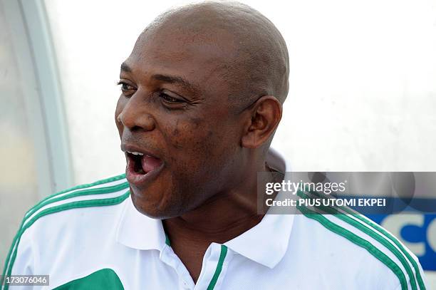 Nigerian Coach Stephen Keshi celebrates his team's goal scored by attacker Mohammad Gambo against Ivory Coast during the 2014 African Nations...