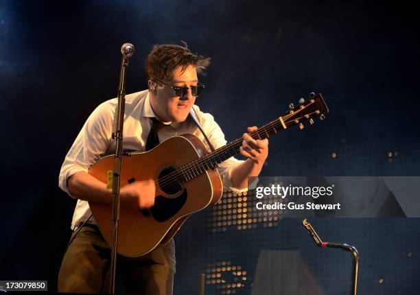 Marcus Mumford of Mumford & Sons performs on stage at The Summer Stampede at Queen Elizabeth Olympic Park on July 6, 2013 in London, England.