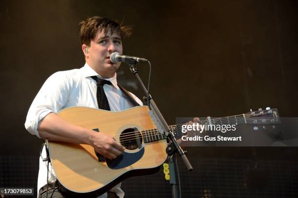 Marcus Mumford of Mumford & Sons performs on stage at The Summer Stampede at Queen Elizabeth Olympic Park on July 6, 2013 in London, England.