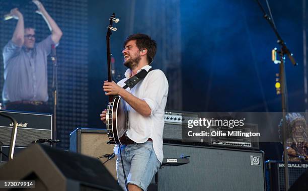 Winston Marshall of Mumford & Sons performs at their biggest headline show to date during the Summer Stampede tour at Olympic Park on July 6, 2013 in...