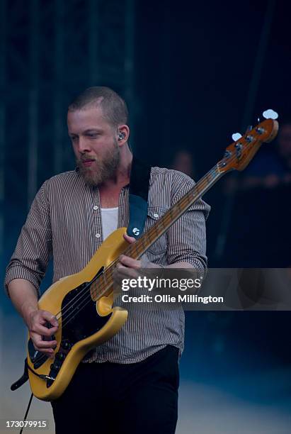 Ted Dwane of Mumford & Sons performs at their biggest headline show to date during the Summer Stampede tour at Olympic Park on July 6, 2013 in...