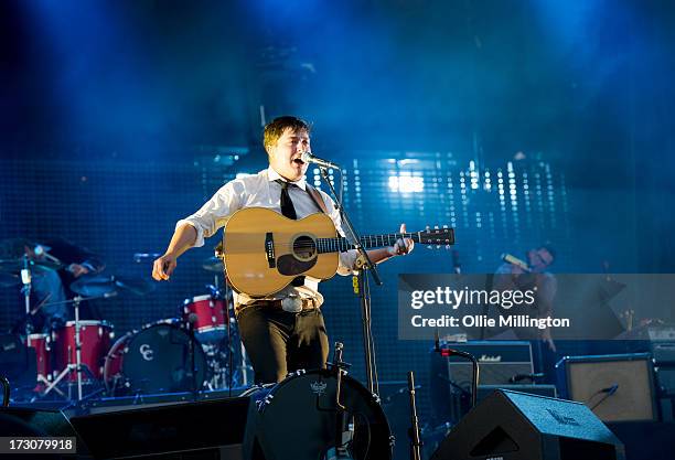 Marcus Mumford of Mumford & Sons performs at their biggest headline show to date during the Summer Stampede tour at Olympic Park on July 6, 2013 in...