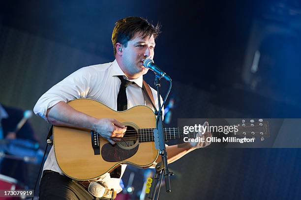 Marcus Mumford of Mumford & Sons performs at their biggest headline show to date during the Summer Stampede tour at Olympic Park on July 6, 2013 in...