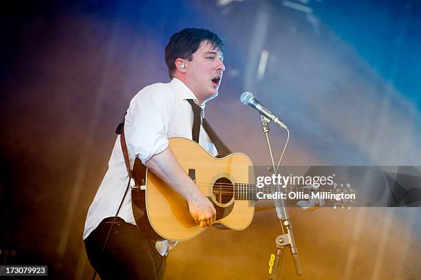 Marcus Mumford of Mumford & Sons performs at their biggest headline show to date during the Summer Stampede tour at Olympic Park on July 6, 2013 in...