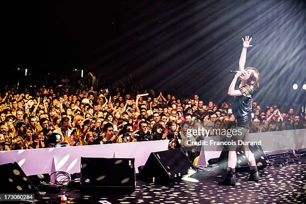 Singer May'n performs during the JE live house 'TOYOTA x STUDIO4AC meets ANA PES' concert during the Japan Expo at Paris-nord Villepinte Exhibition...