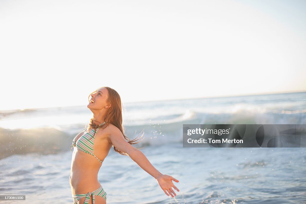 Smiling woman enjoying beach