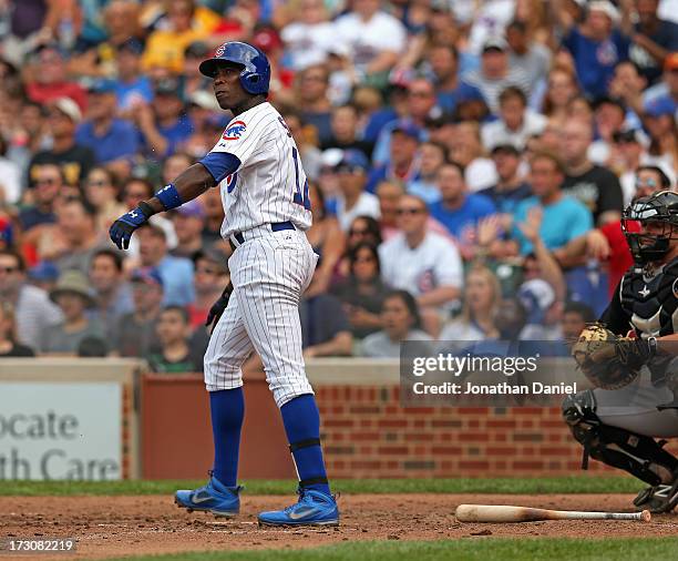 Alfonso Soriano of the Chicago Cubs watches as his second two-run home run of the game sails out of the park in the 5th inning against the Pittsburgh...