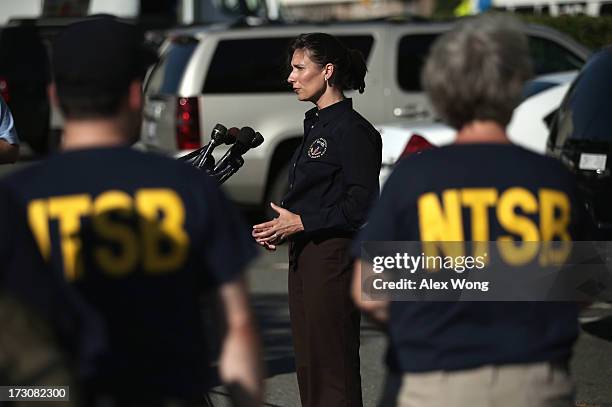 National Transportation Safety Board Chairwoman Deborah Hersman speaks to members of the media prior to her departure with an NTSB "go-team" for San...