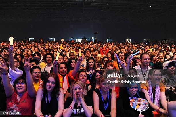 People gather to the JE live house 'TOYOTA x STUDIO4AC meets ANA PES' concert during the Japan Expo at Paris-nord Villepinte Exhibition Center on...