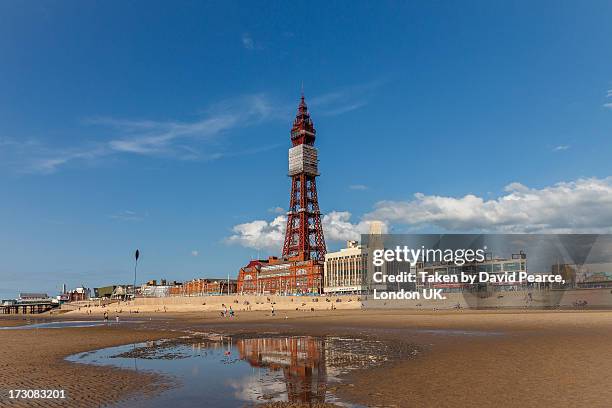 blackpool tower, from the beach. - blackpool stock pictures, royalty-free photos & images