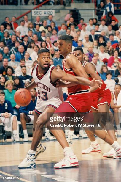 University of Connecticut basketball player Lyman DePriest with the ball, Storrs, Connecticut, 1990.