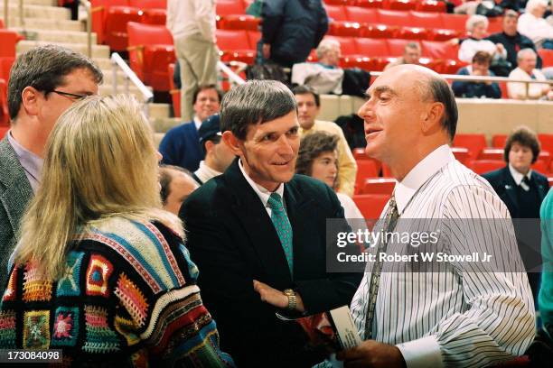 Sports journalist Dick Vitale of ESPN talks with several people, among them University of Connecticut Associate Athletic Director Tim Tolokan ,...