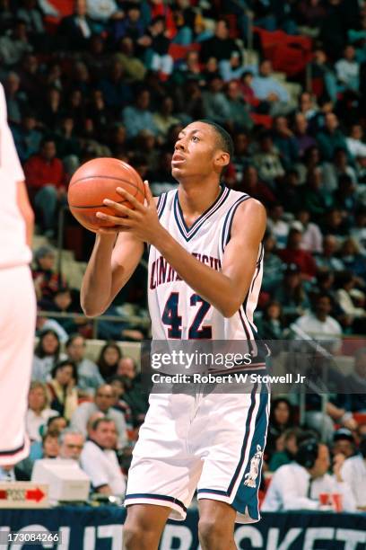 University of Connecticut basketball player Donyell Marshall lines up a free throw at the foul line, Storrs, Connecticut, 1994.