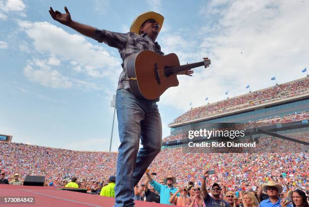 Garth Brooks performs during the Oklahoma Twister Relief Concert to benefit United Way of Central Oklahoma May Tornadoes Relief Fund at Gaylord...