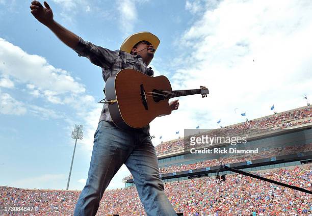 Garth Brooks performs during the Oklahoma Twister Relief Concert to benefit United Way of Central Oklahoma May Tornadoes Relief Fund at Gaylord...