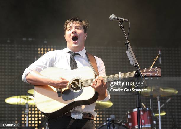 Marcus Mumford of Mumford & Sons performs on stage at The Summer Stampede at Queen Elizabeth Olympic Park on July 6, 2013 in London, England.