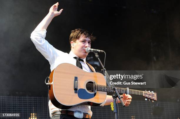 Marcus Mumford of Mumford & Sons performs on stage at The Summer Stampede at Queen Elizabeth Olympic Park on July 6, 2013 in London, England.