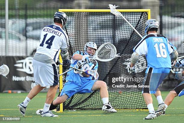 Drew Westervelt of the Chesapeake Bayhawks scores on goalie Brian Phipps of the Ohio Machine in the first period on July 6, 2013 at Selby Stadium in...