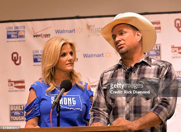 Musicians Trisha Yearwood and Garth Brooks speak in the press room at the Oklahoma Twister Relief Concert to benefit United Way of Central Oklahoma...