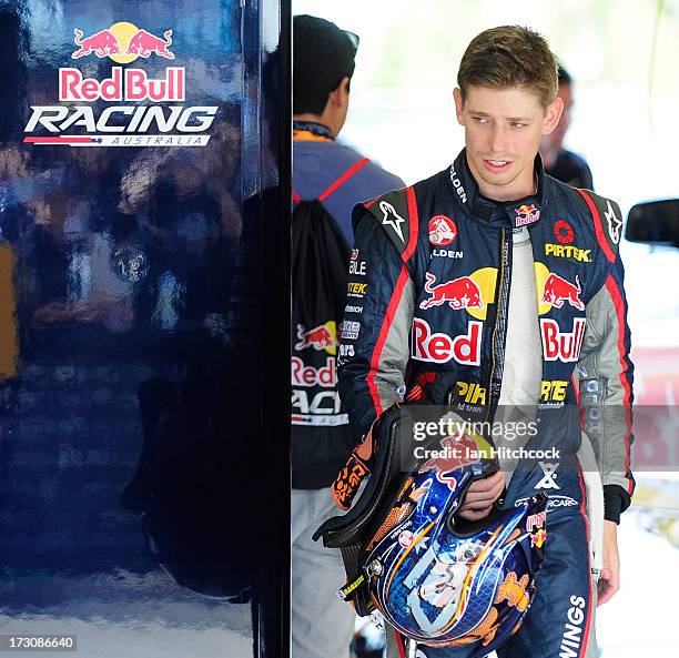 Casey Stoner from the Red Bull Pirtek Holden walks through the garage after finishing race 2 for the round three of the V8 Supercars Dunlop...