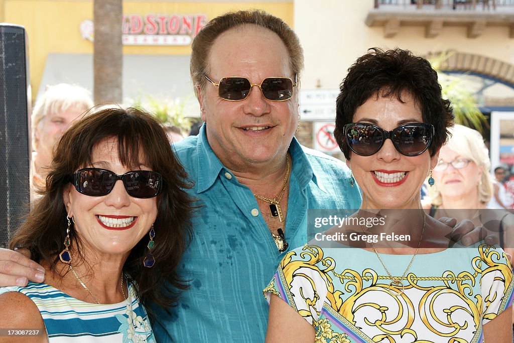 Linda Fineo, Harry Wayne "KC" Casey and Victoria Phillips attend Palm