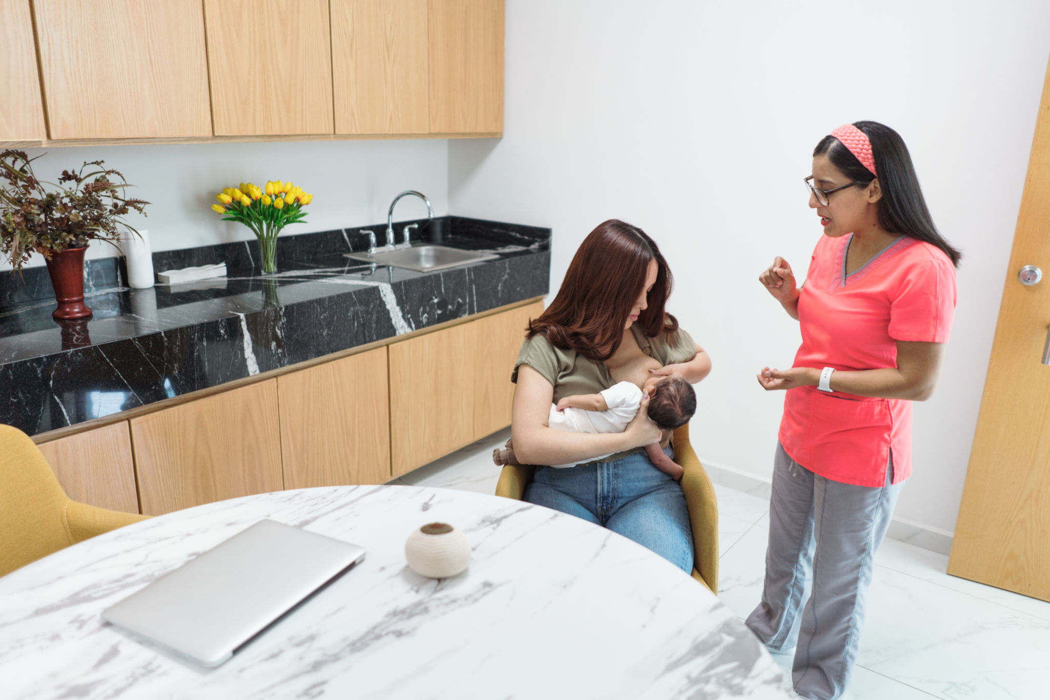 Mother breastfeeding Mother breastfeeding