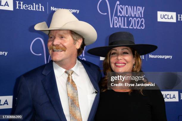 Guest and Kelly LeBrock attend the UCLA Department of Neurosurgery's 2023 Visionary Ball at The Beverly Hilton on October 11, 2023 in Beverly Hills,...