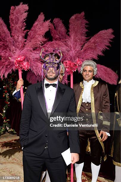 Designer Fausto Puglisi attends the 'Ballo in Maschera' to Celebrate Dolce&Gabbana Alta Moda at Palazzo Pisani Moretta on July 6, 2013 in Venice,...