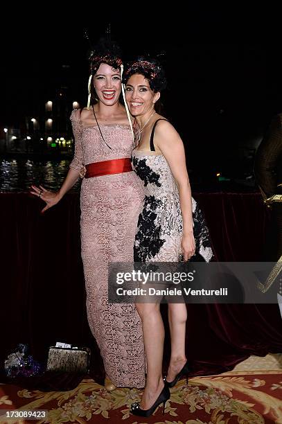 Daisy Lowe and Caterina Murino attends the 'Ballo in Maschera' to Celebrate Dolce&Gabbana Alta Moda at Palazzo Pisani Moretta on July 6, 2013 in...