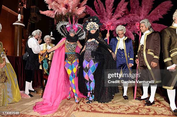 Giovanna Battaglia and Sara Battaglia attend the 'Ballo in Maschera' to Celebrate Dolce&Gabbana Alta Moda at Palazzo Pisani Moretta on July 6, 2013...