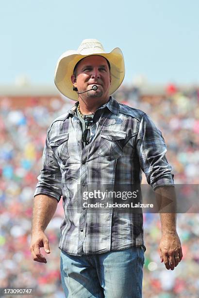 Singer Garth Brooks performs during the Oklahoma Twister Relief Concert to benefit United Way of Central Oklahoma May Tornadoes Relief Fund at...