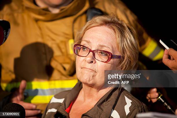 Colette Roy-Laroche, mayor of Lac-Mégantic, speaks during a press conference after a freight train loaded with oil derailed in Lac-Megantic in...