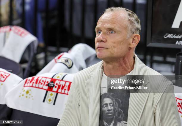 Bass player Flea of the band Red Hot Chili Peppers looks on during warmups before Game Two of the 2023 WNBA Playoffs finals between the New York...