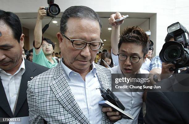 Yoon Young-Doo, President of the Asiana Airlines after his media briefing at their headquarters on July 7, 2013 in Seoul, South Korea. Two people are...